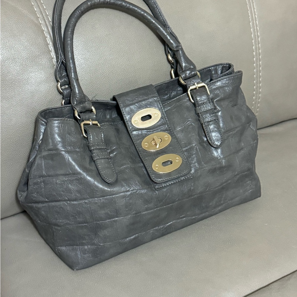 MMS statute, designer shoulder bag